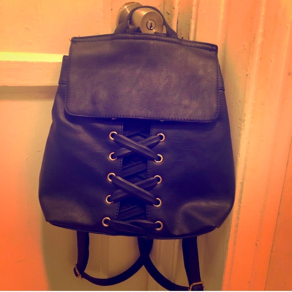 ISO: Black Lace-Up Backpack